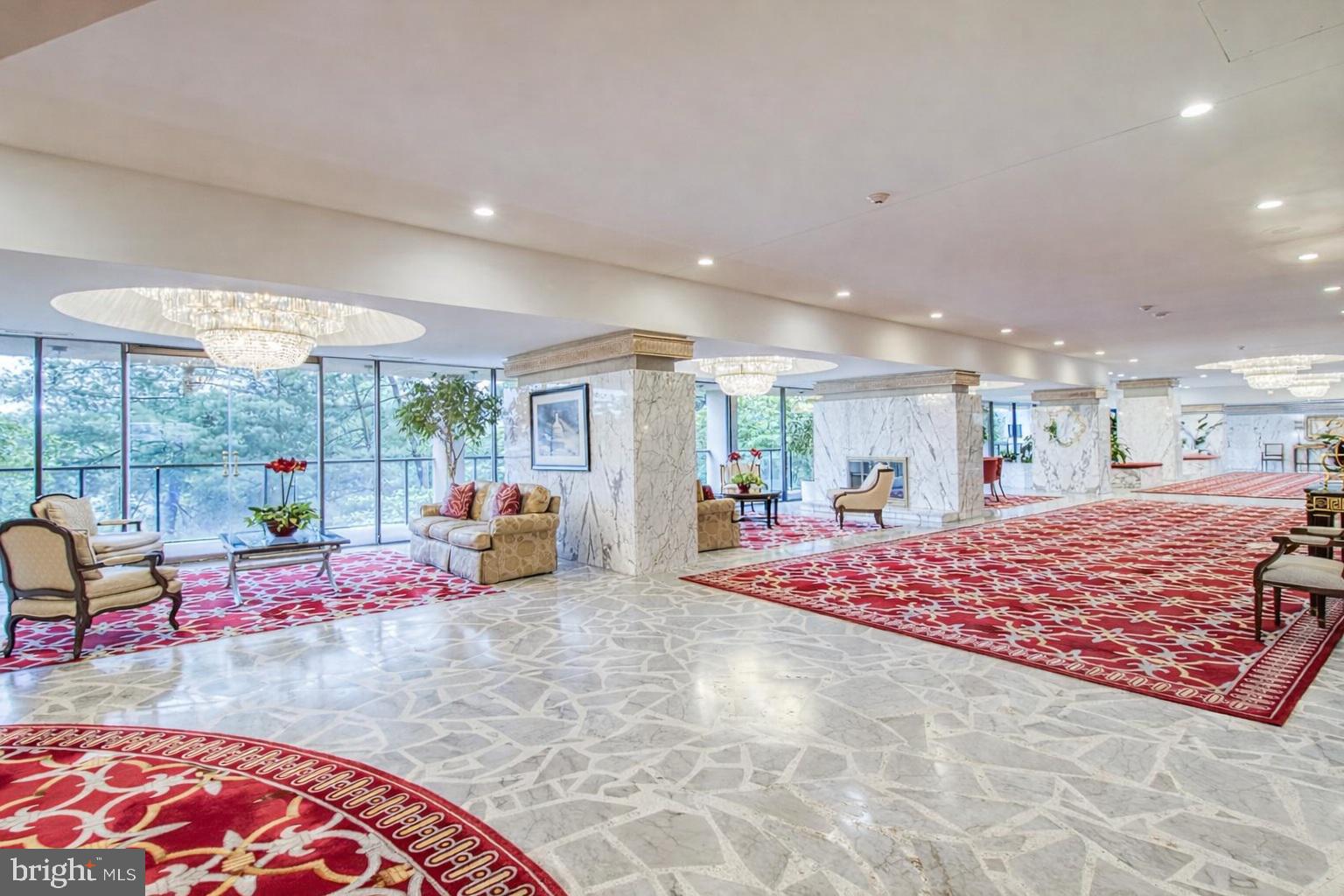 1101 South Arlington Ridge Road, Unit 504 Arlington, VA 22202 - Photo 35 of 37 a bed room with a bed and glass window