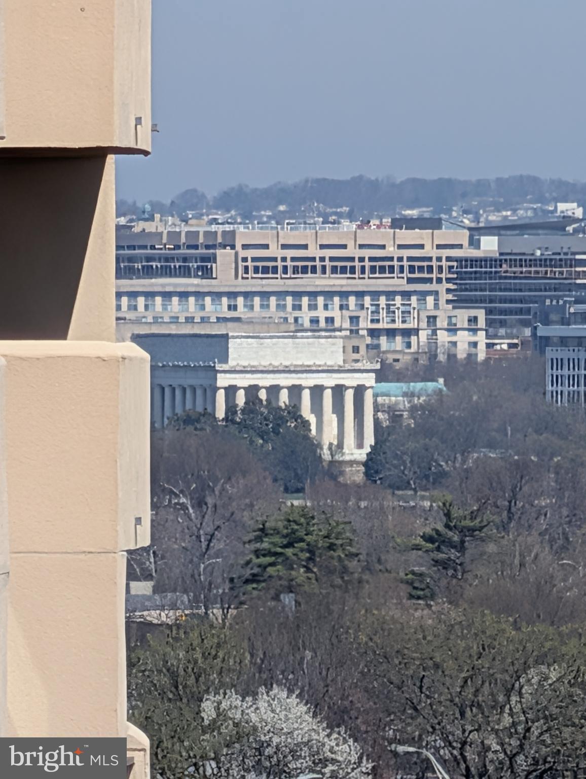 1101 South Arlington Ridge Road, Unit 504 Arlington, VA 22202 - Photo 4 of 37 a view of a large building with a yard