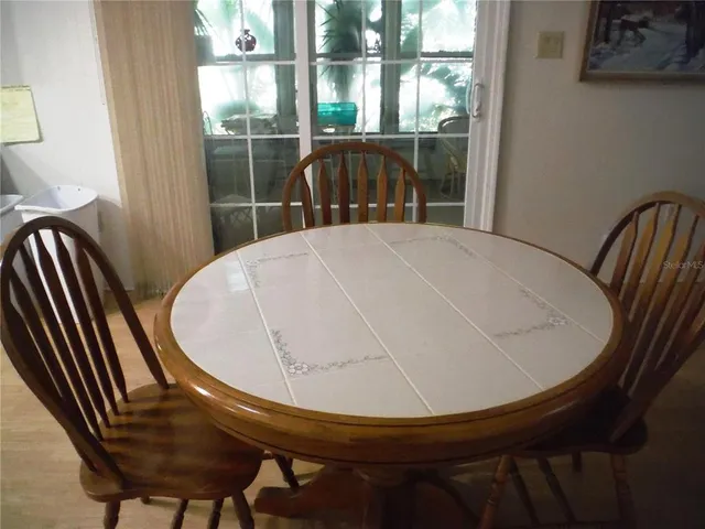 a living room with furniture and window
