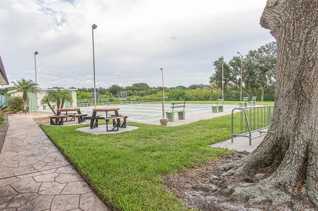 a view of a park with swings and slides
