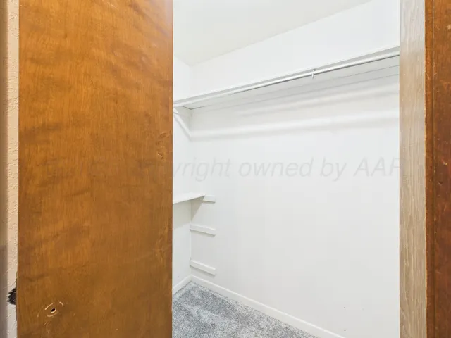 a bathroom with a sink and a large mirror