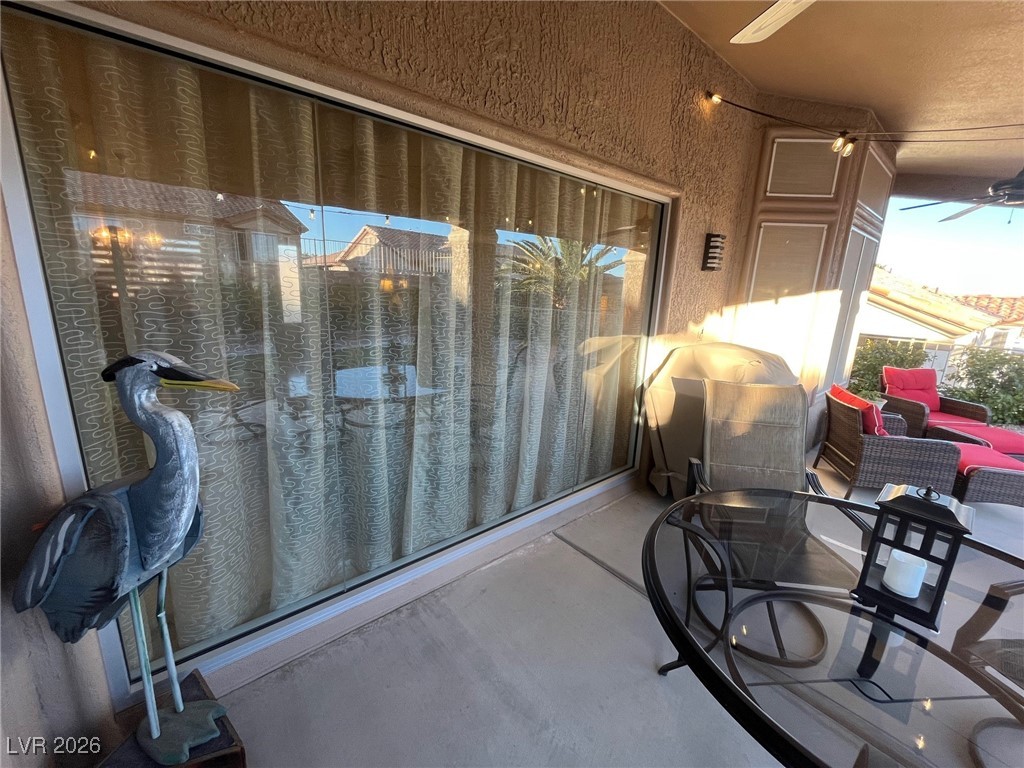 11021 Rackhurst Avenue Las Vegas, NV 89134 - Photo 12 of 53 Huge living room window faces expanded back porch