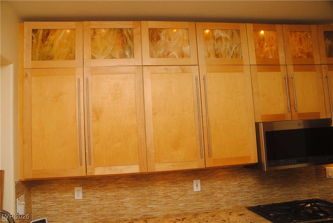 11021 Rackhurst Avenue Las Vegas, NV 89134 - Photo 13 of 53 custom lit kitchen cabinets