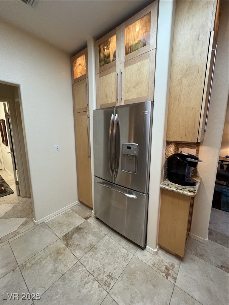 11021 Rackhurst Avenue Las Vegas, NV 89134 - Photo 26 of 53 Stainless Refrigerator and custom lighted cabinetry
