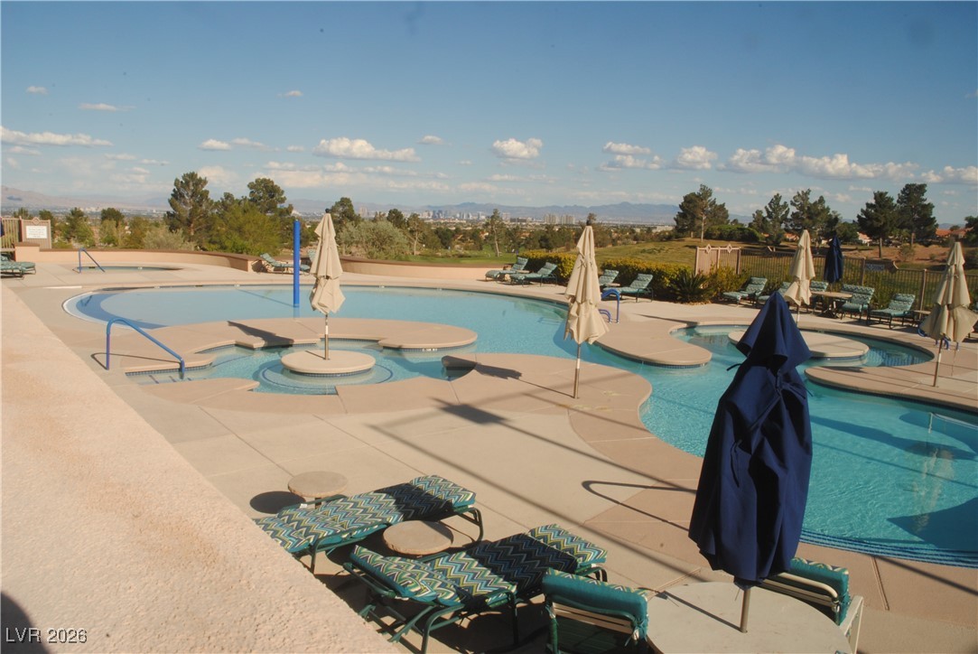 11021 Rackhurst Avenue Las Vegas, NV 89134 - Photo 45 of 53 Pinnacle Pool with views of the Strip