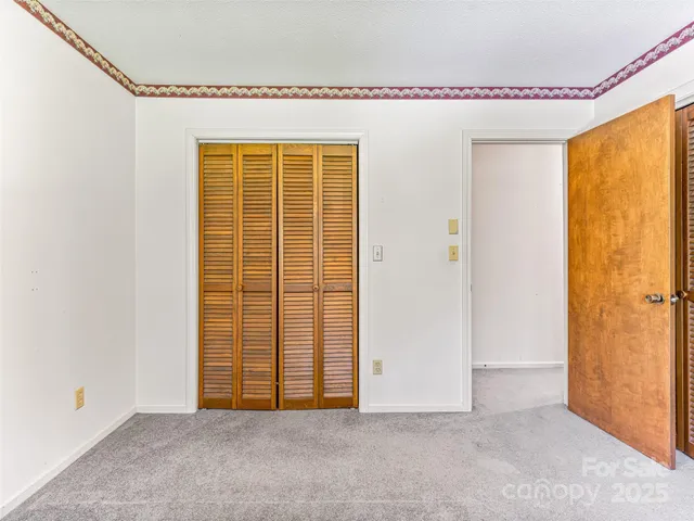 a view of an empty room with window