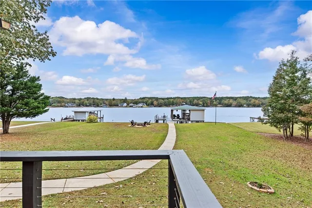 a view of a chairs and table on the wooden floor