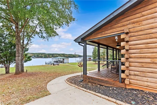a view of a lake with a garden and lake view