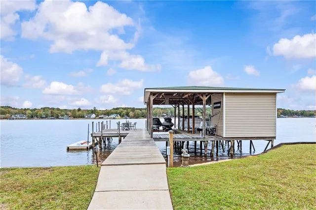 a view of swimming pool with a patio