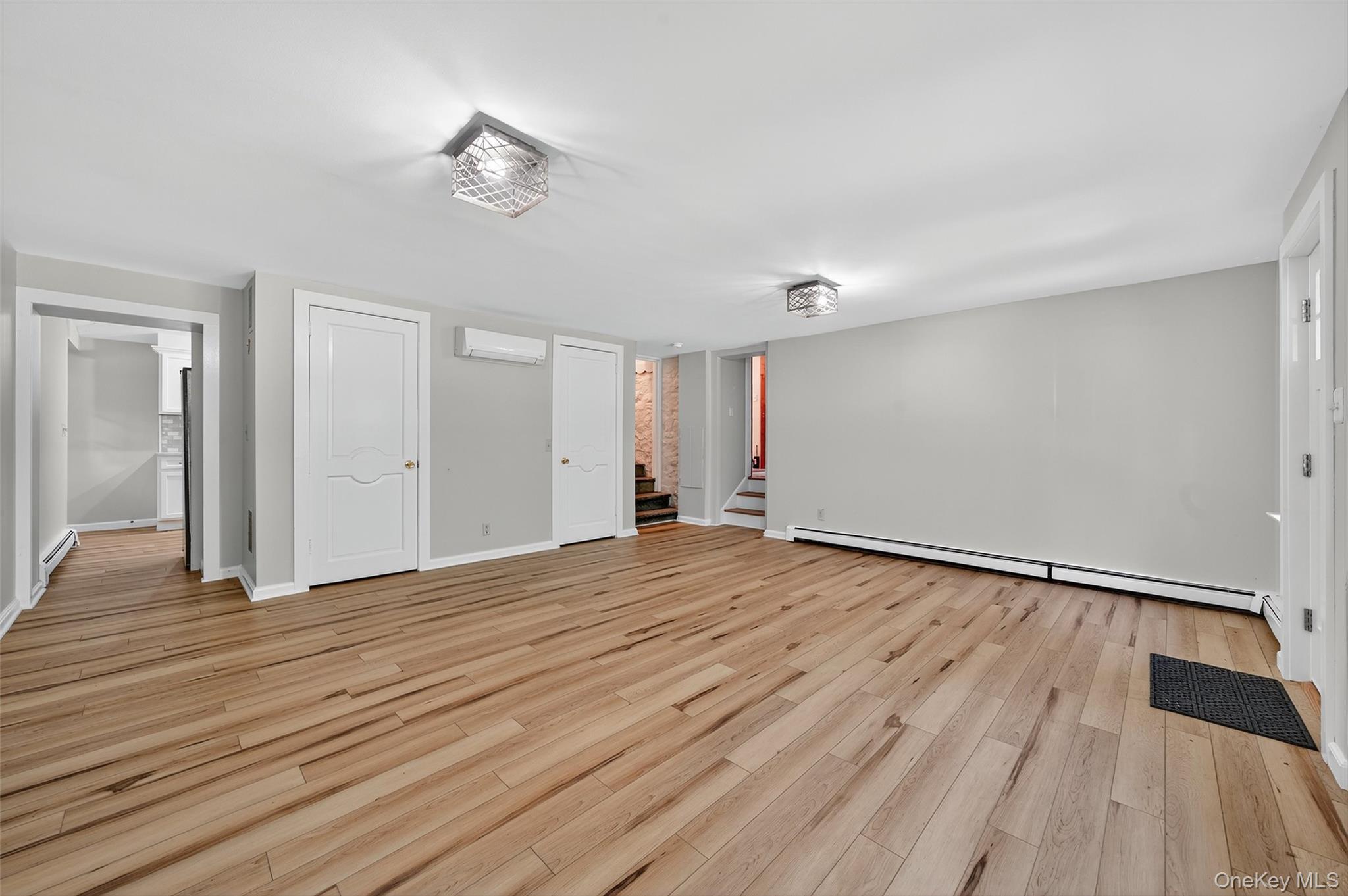 91 Sleepy Valley Road Warwick, NY 10990 - Photo 8 of 30 a view of an empty room with wooden floor