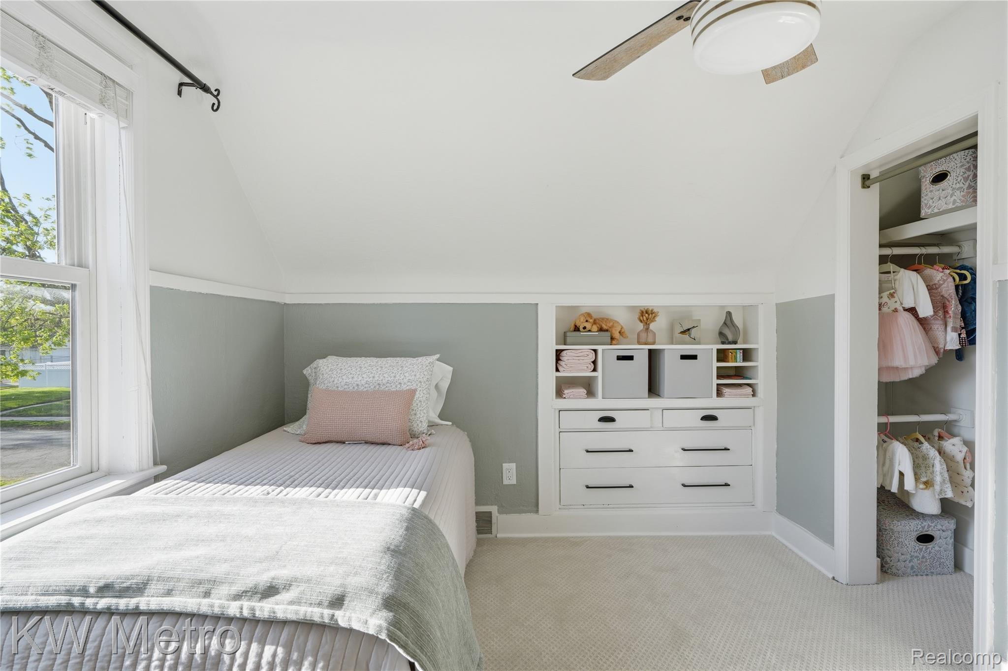 1861 Harvard Road Berkley, MI 48072 - Photo 17 of 27 Bedroom with vaulted ceiling, a closet, light colored carpet, and ceiling fan