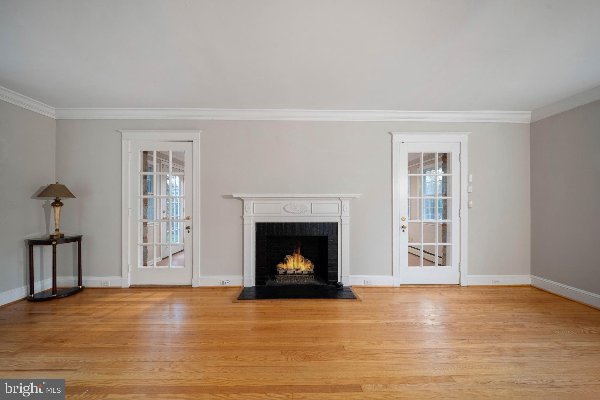 101 Thicket Road Baltimore, MD 21212 - Photo 11 of 30 a view of a livingroom with a fireplace and window