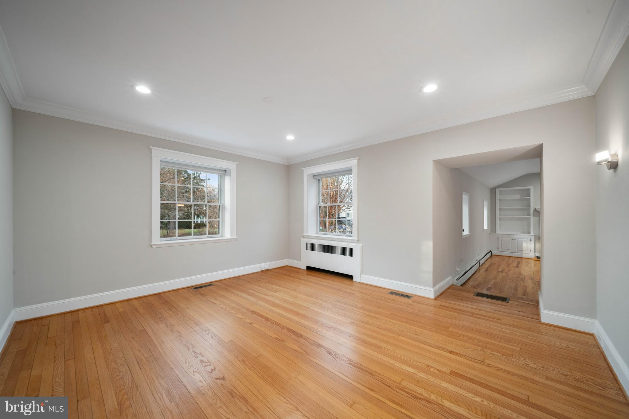 101 Thicket Road Baltimore, MD 21212 - Photo 18 of 30 wooden floor in an empty room with a window