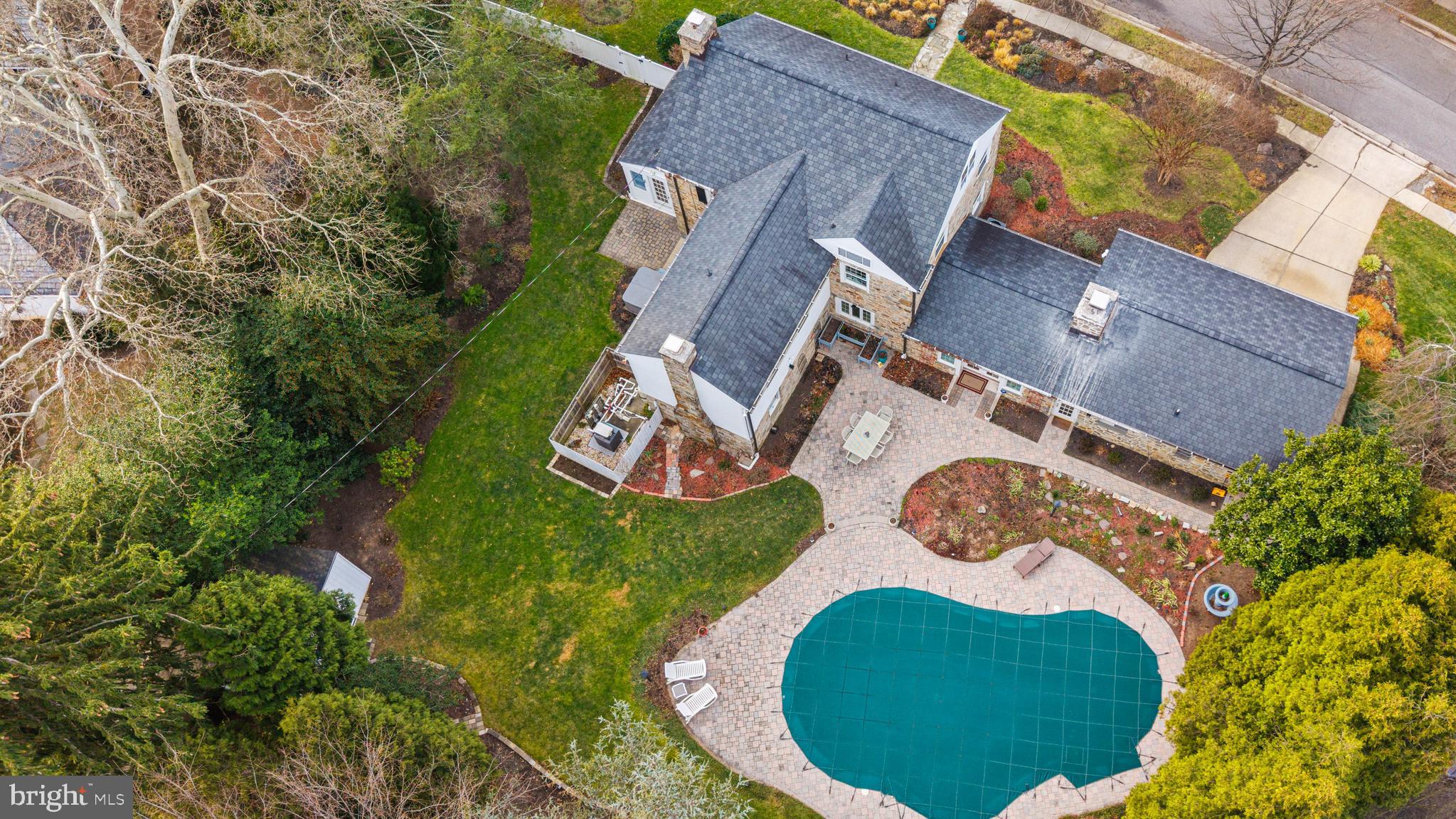 101 Thicket Road Baltimore, MD 21212 - Photo 8 of 30 an aerial view of a house with outdoor space and trees all around
