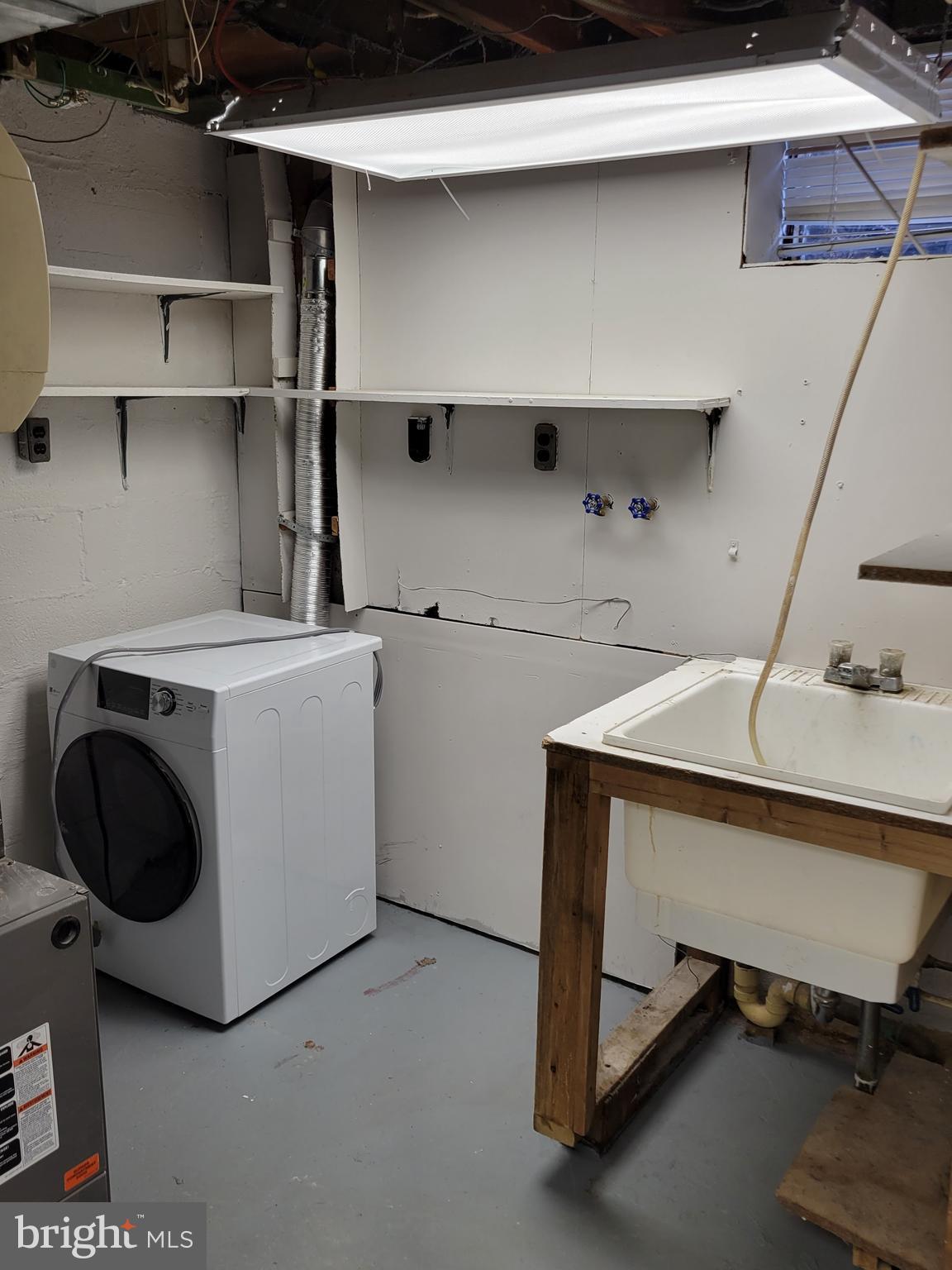 536 Crotzer Avenue Folcroft, PA 19032 - Photo 27 of 35 a utility room with dryer and washer
