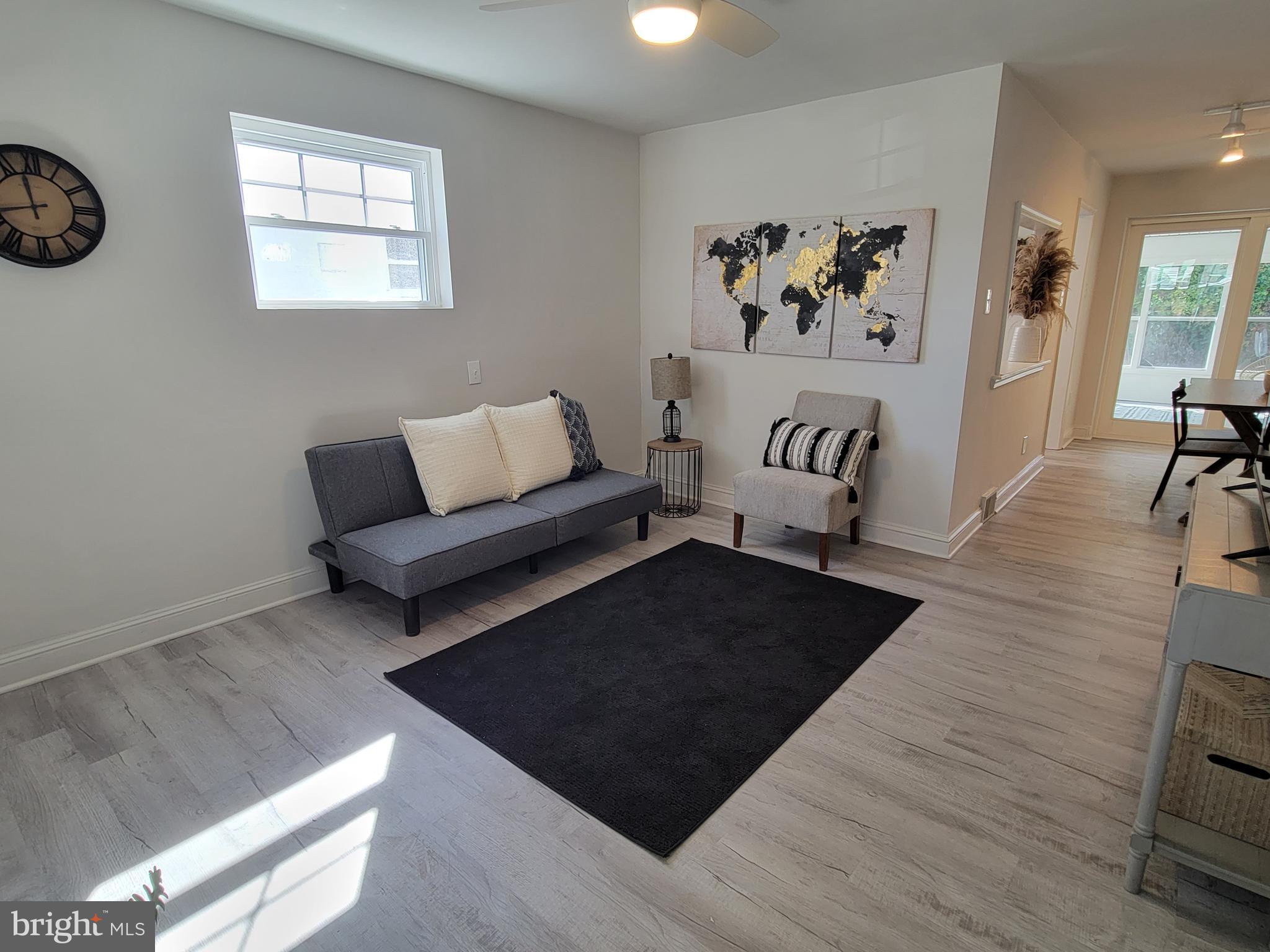 536 Crotzer Avenue Folcroft, PA 19032 - Photo 4 of 35 a living room with furniture and a rug