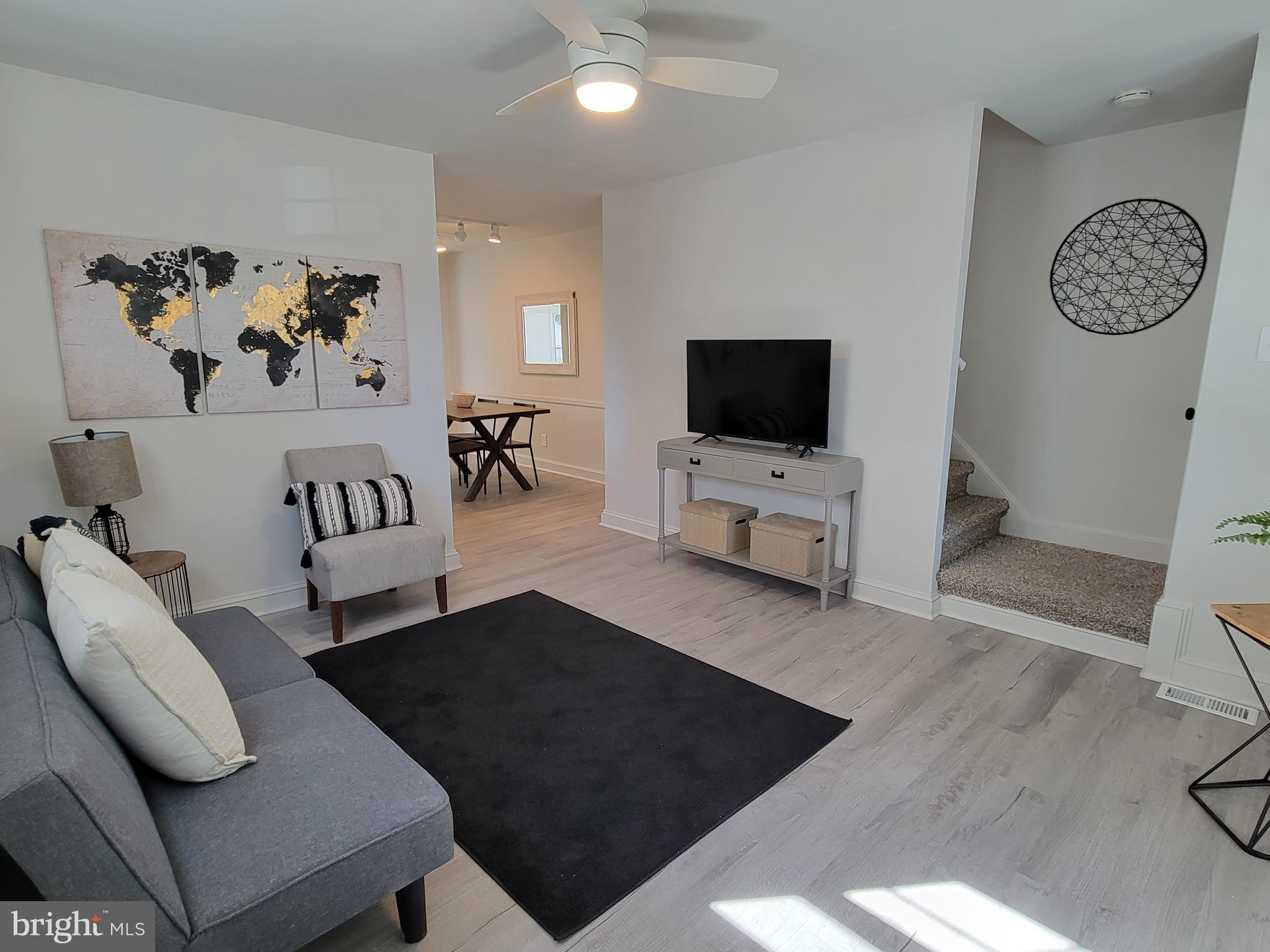 536 Crotzer Avenue Folcroft, PA 19032 - Photo 5 of 35 a living room with furniture and a flat screen tv