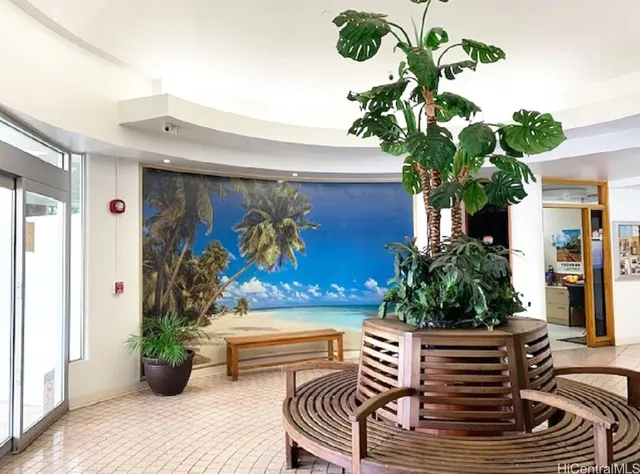 a vase of flowers sitting on a dining table