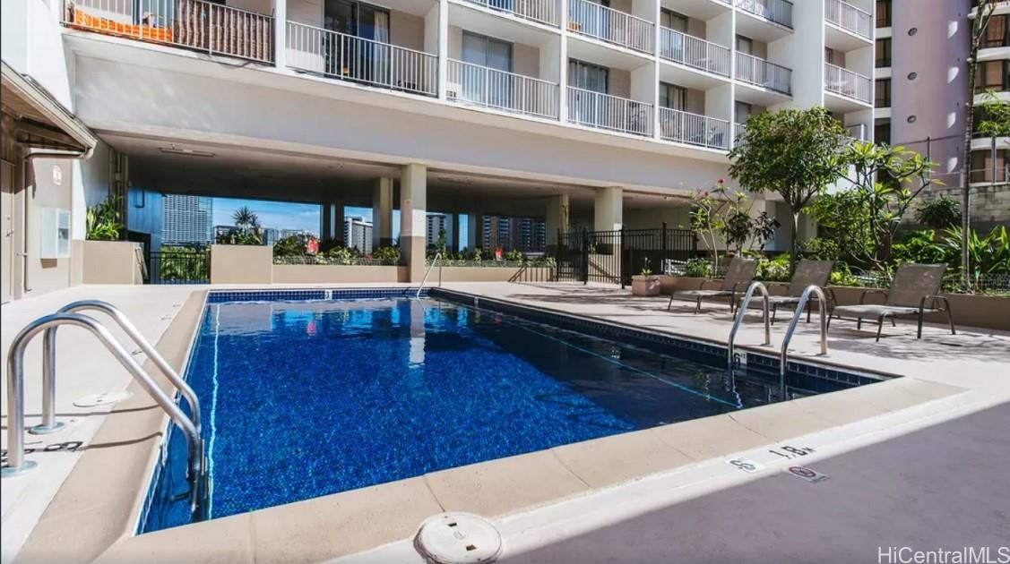 1920 Ala Moana Boulevard, Unit 2006 Honolulu, HI 96815 - Photo 6 of 7 a view of a house with sitting area and furniture