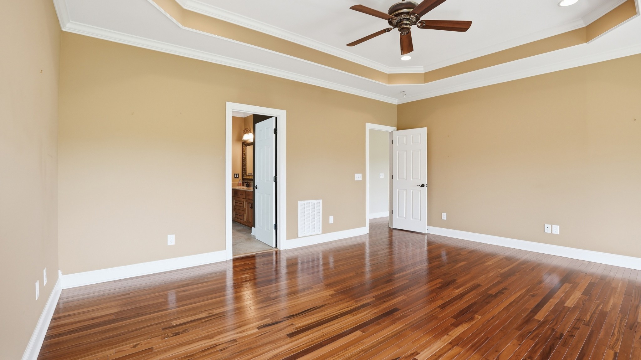 292 Ridgecrest Drive Winchester, TN 37398 - Photo 32 of 62 a view of an empty room with wooden floor and a ceiling fan