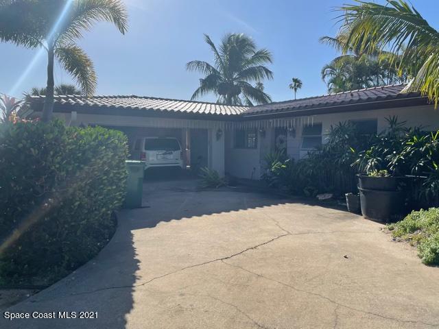 138 Bimini Road Cocoa Beach, FL 32931 - Photo 10 of 11 front of house