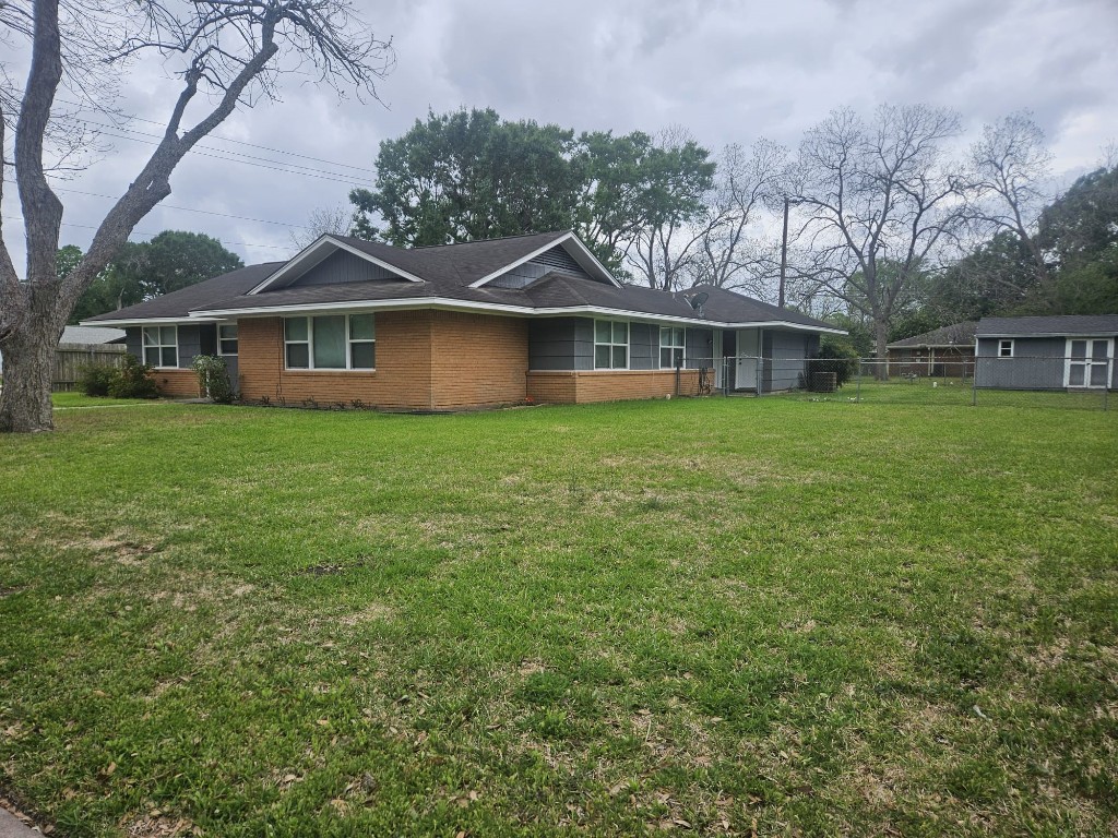 1518 Lawrence Street Rosenberg, TX 77471 - Photo 3 of 17 View from down the street