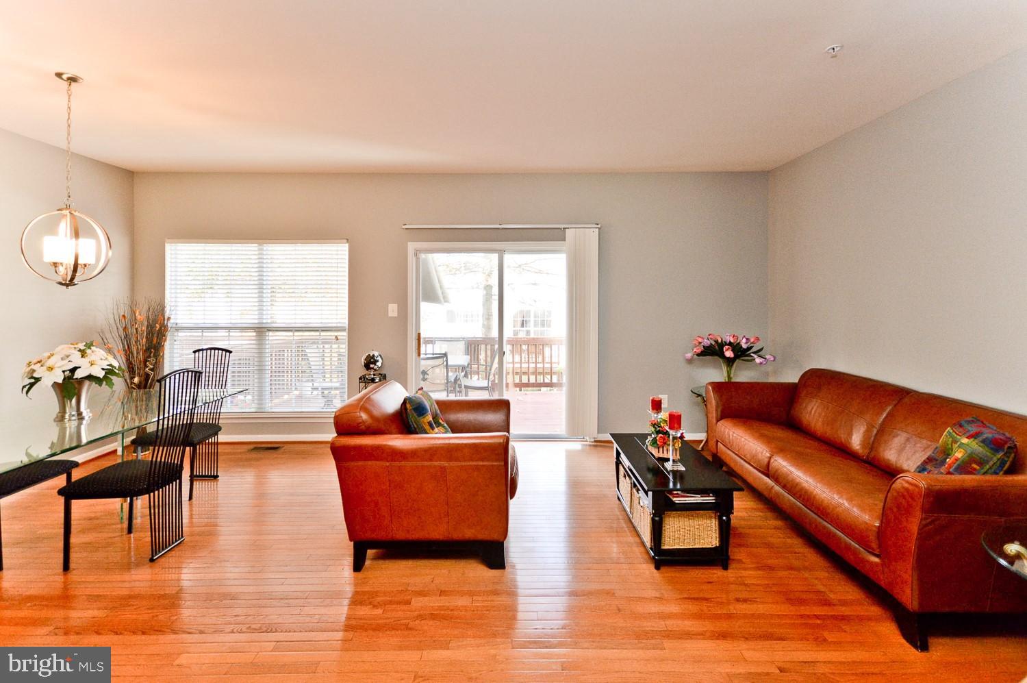 1113 Ring Bill Loop Upper Marlboro, MD 20774 - Photo 12 of 39 a living room with furniture and a large window