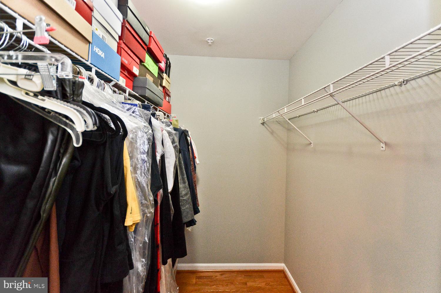 1113 Ring Bill Loop Upper Marlboro, MD 20774 - Photo 27 of 39 a view of walk in closet with clothes and shoes