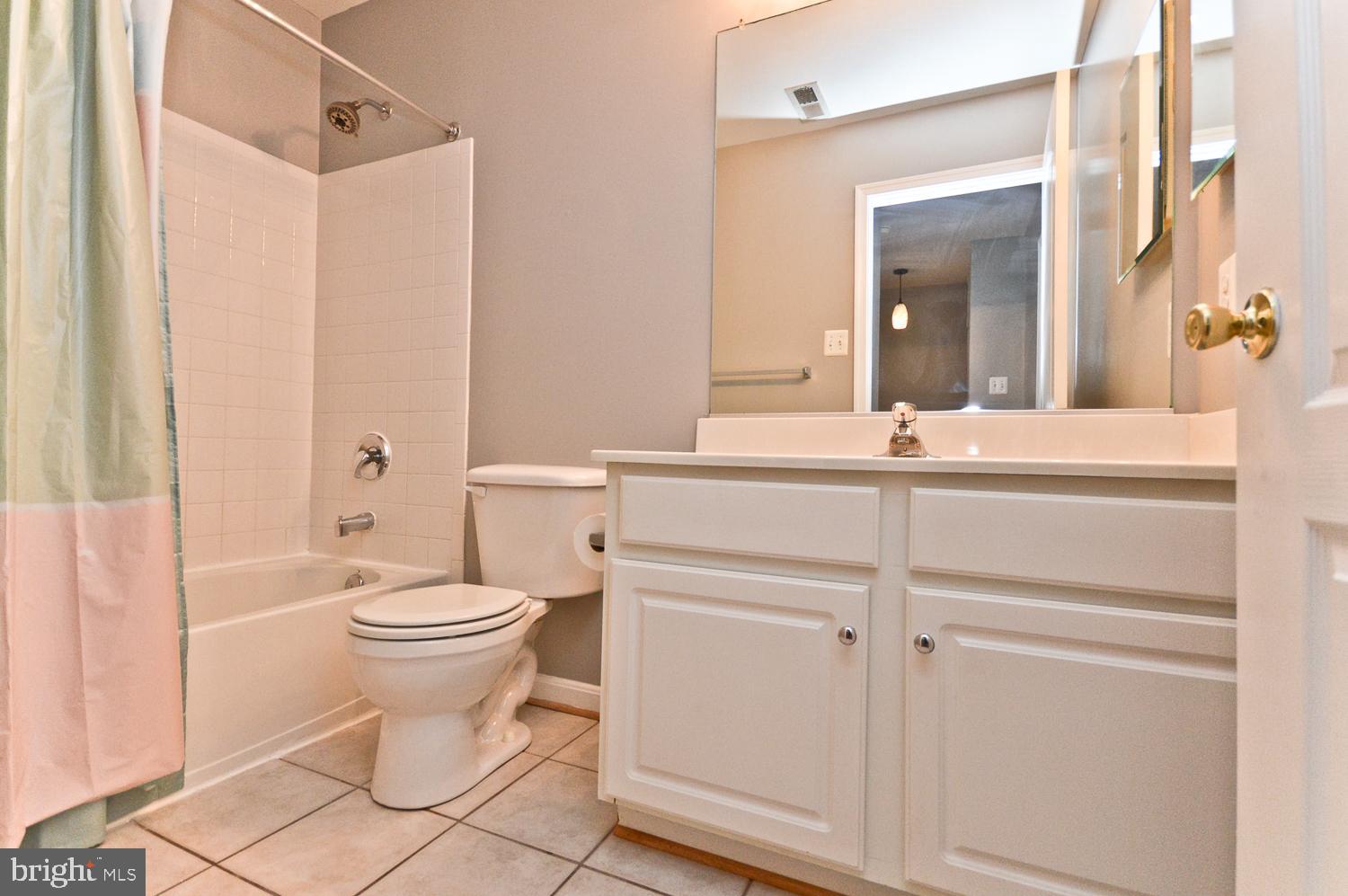 1113 Ring Bill Loop Upper Marlboro, MD 20774 - Photo 31 of 39 a bathroom with a sink toilet and shower