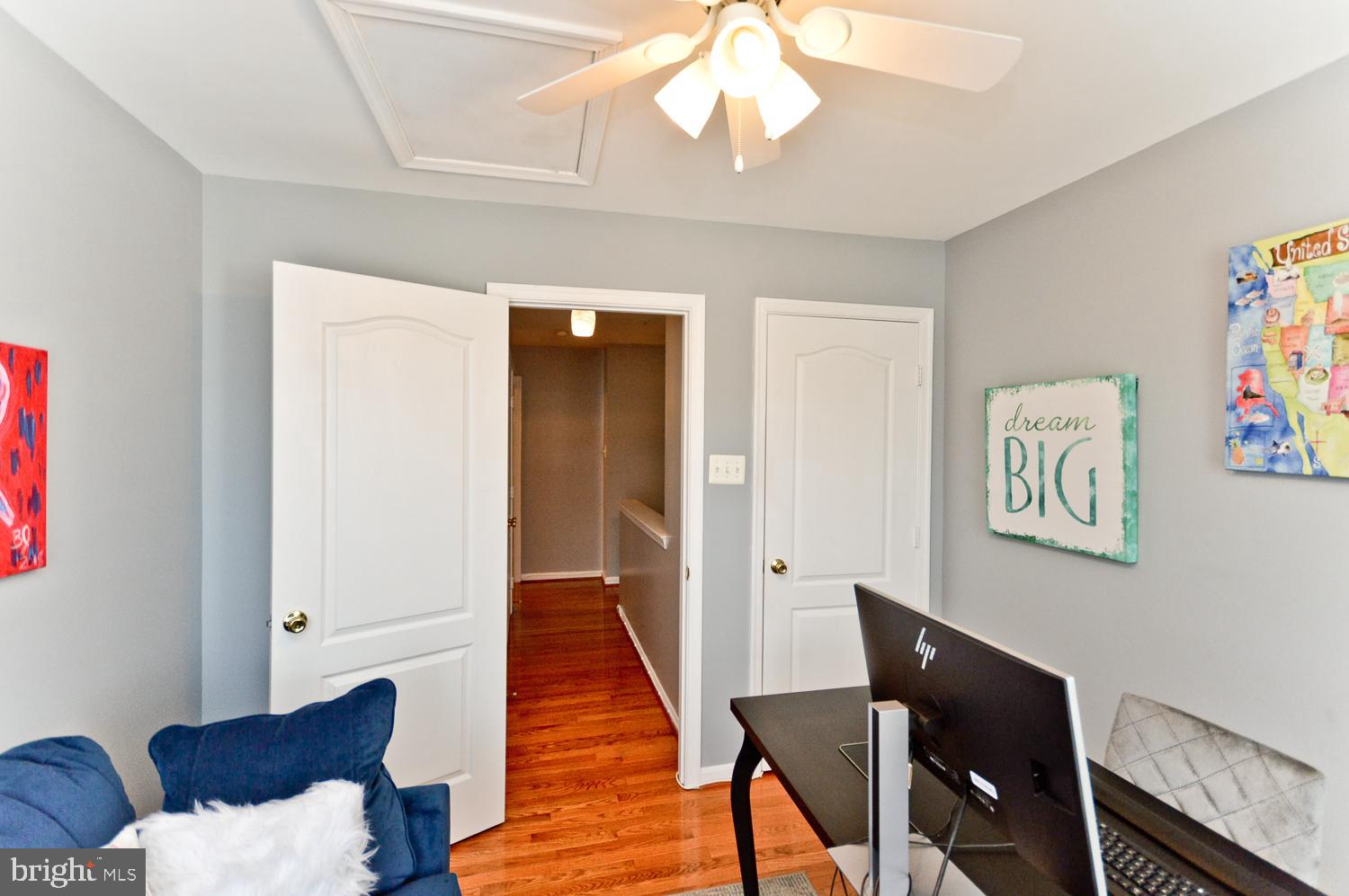 1113 Ring Bill Loop Upper Marlboro, MD 20774 - Photo 34 of 39 a view of a livingroom with furniture and wooden floor