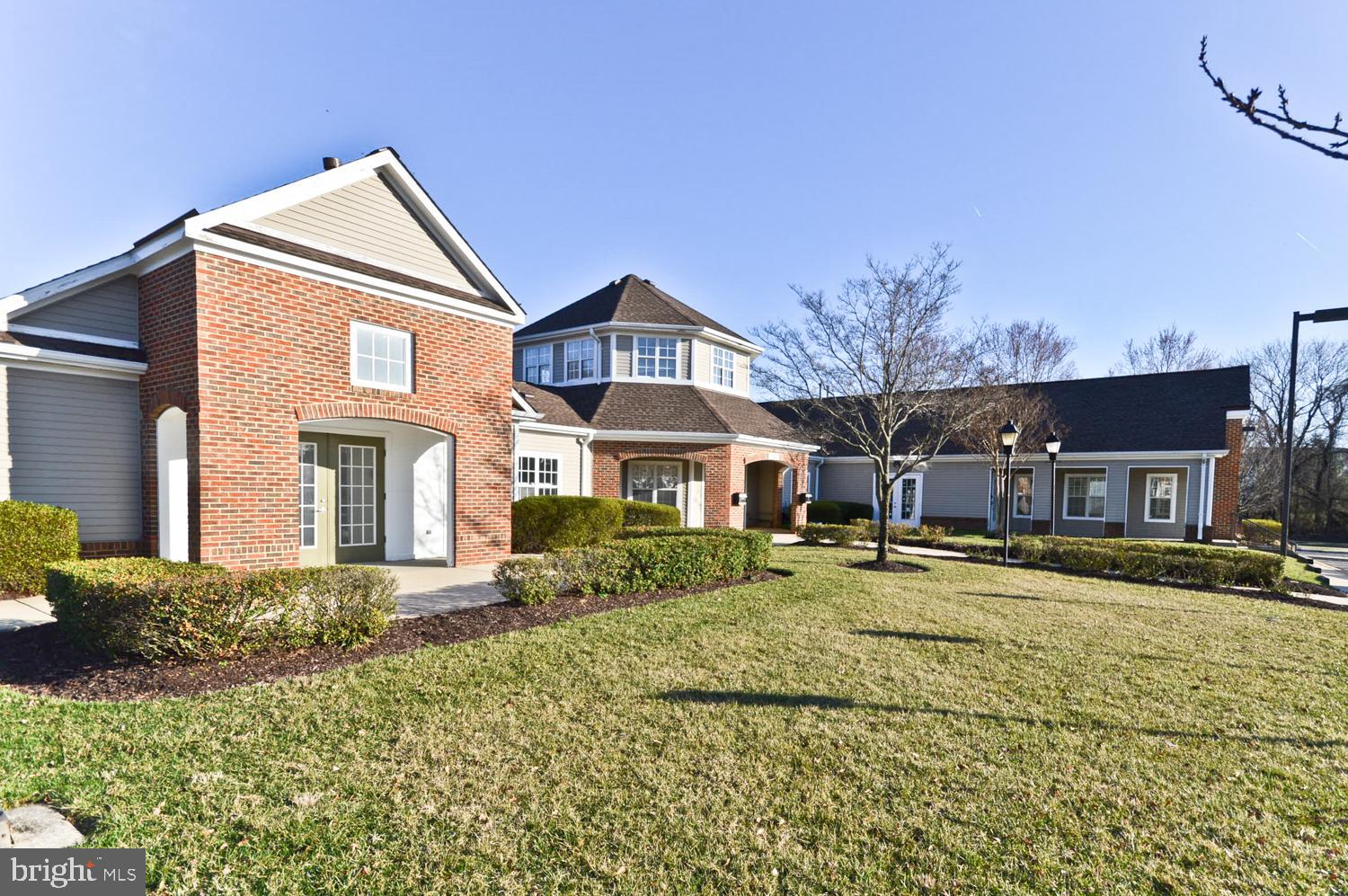 1113 Ring Bill Loop Upper Marlboro, MD 20774 - Photo 36 of 39 a front view of a house with a yard