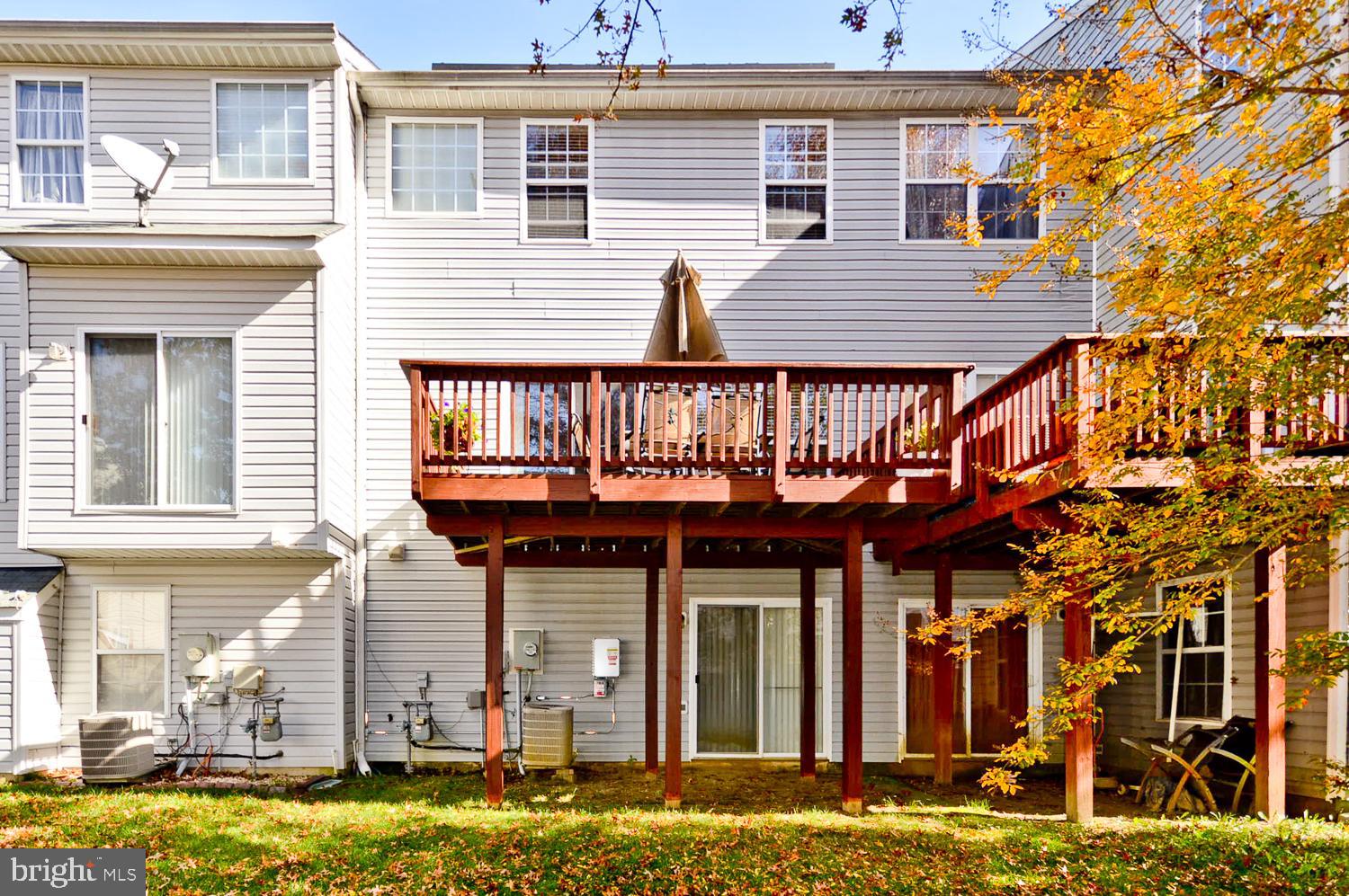 1113 Ring Bill Loop Upper Marlboro, MD 20774 - Photo 4 of 39 a front view of a house with swimming pool