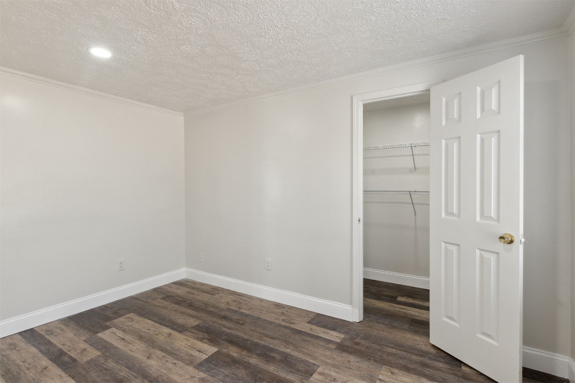 97119 Diamond Street Yulee, FL 32097 - Photo 18 of 23 wooden floor in an empty room