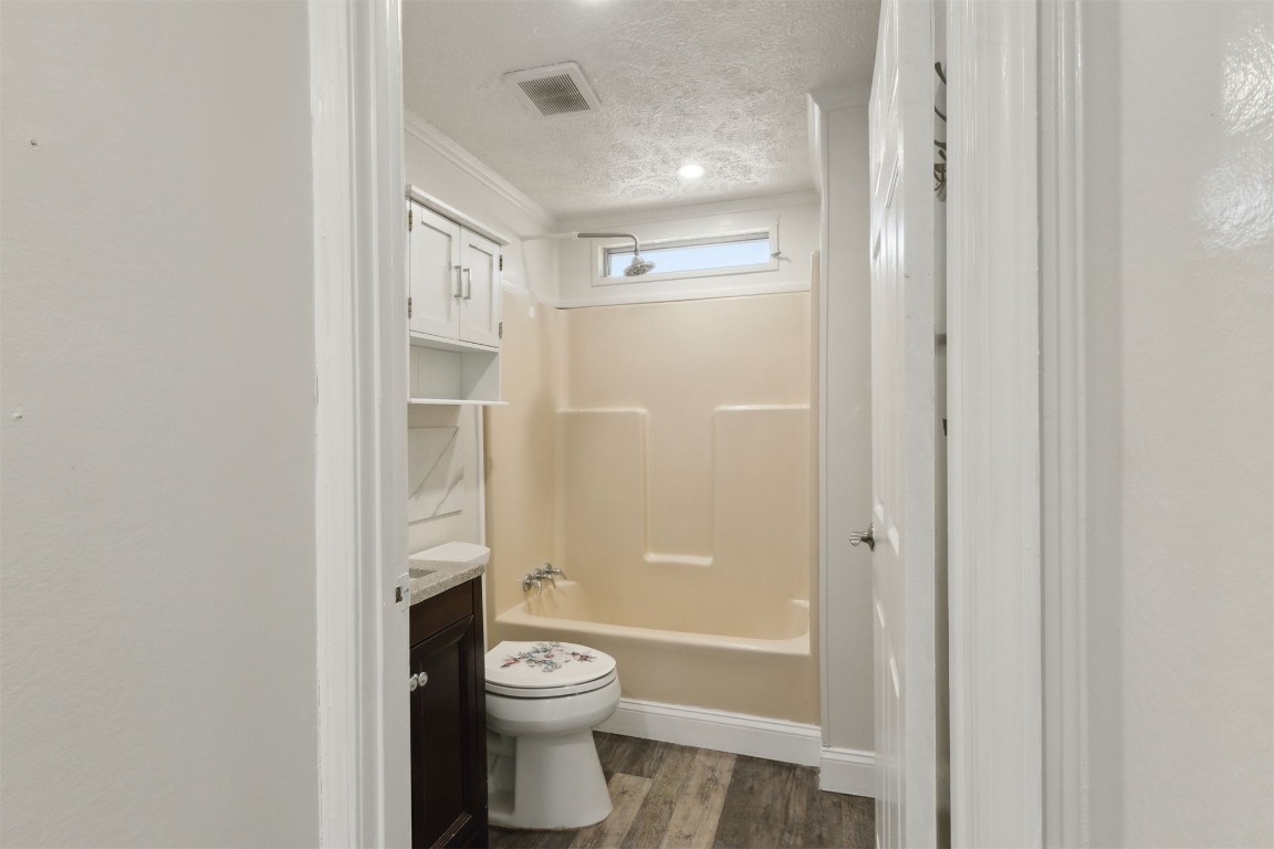 97119 Diamond Street Yulee, FL 32097 - Photo 19 of 23 a bathroom with a toilet and a shower
