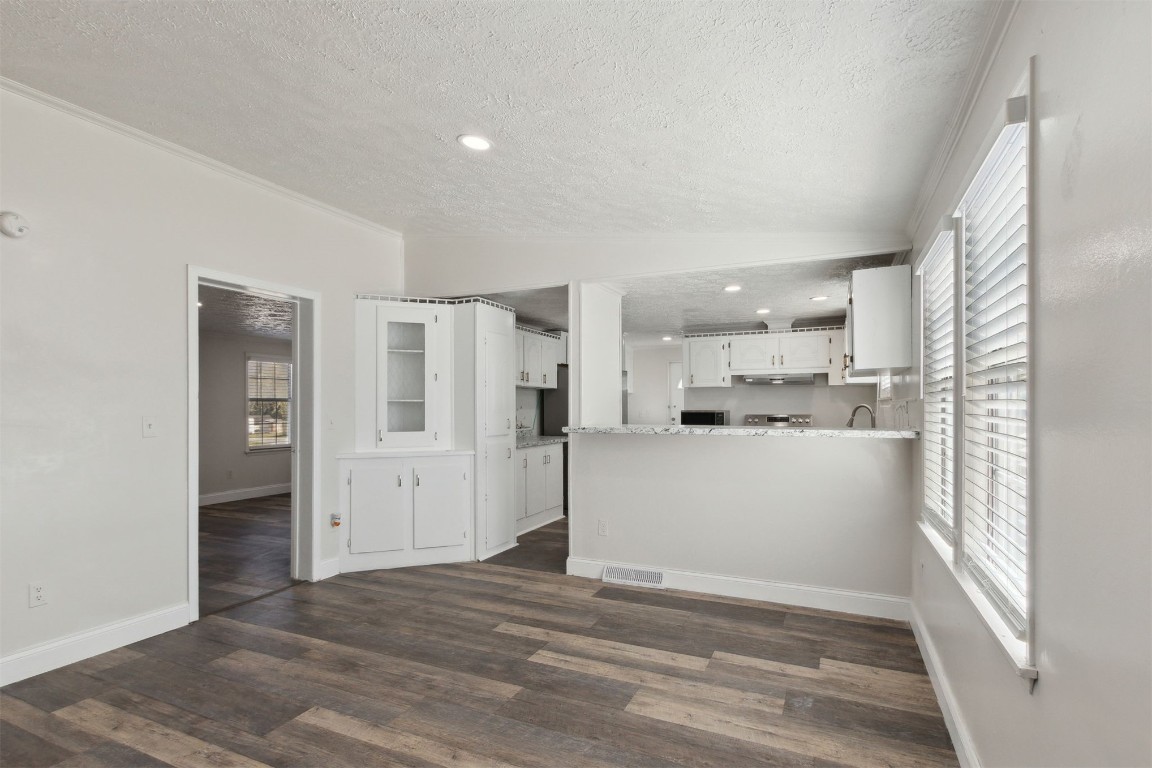 97119 Diamond Street Yulee, FL 32097 - Photo 9 of 23 a view of a kitchen with refrigerator and window