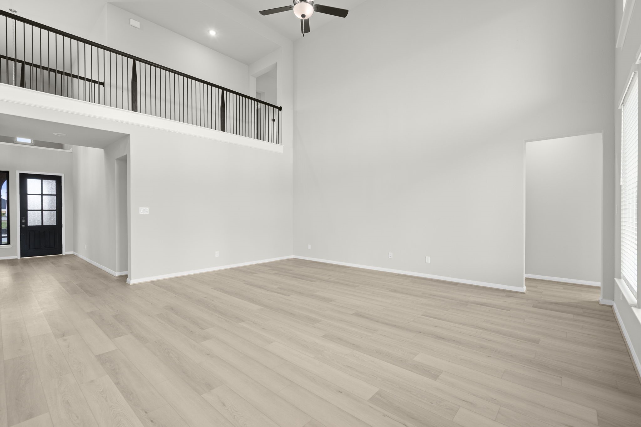 6402 Citron Elm Road Manvel, TX 77578 - Photo 13 of 37 en empty room with wooden floor
