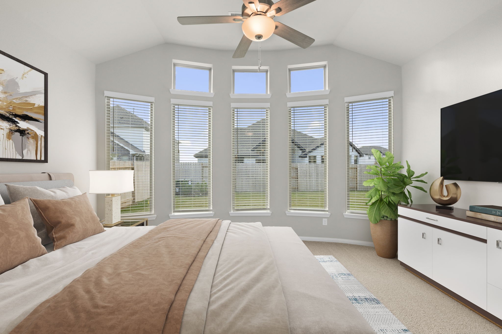 6402 Citron Elm Road Manvel, TX 77578 - Photo 17 of 37 a bedroom with a bed and a flat screen tv