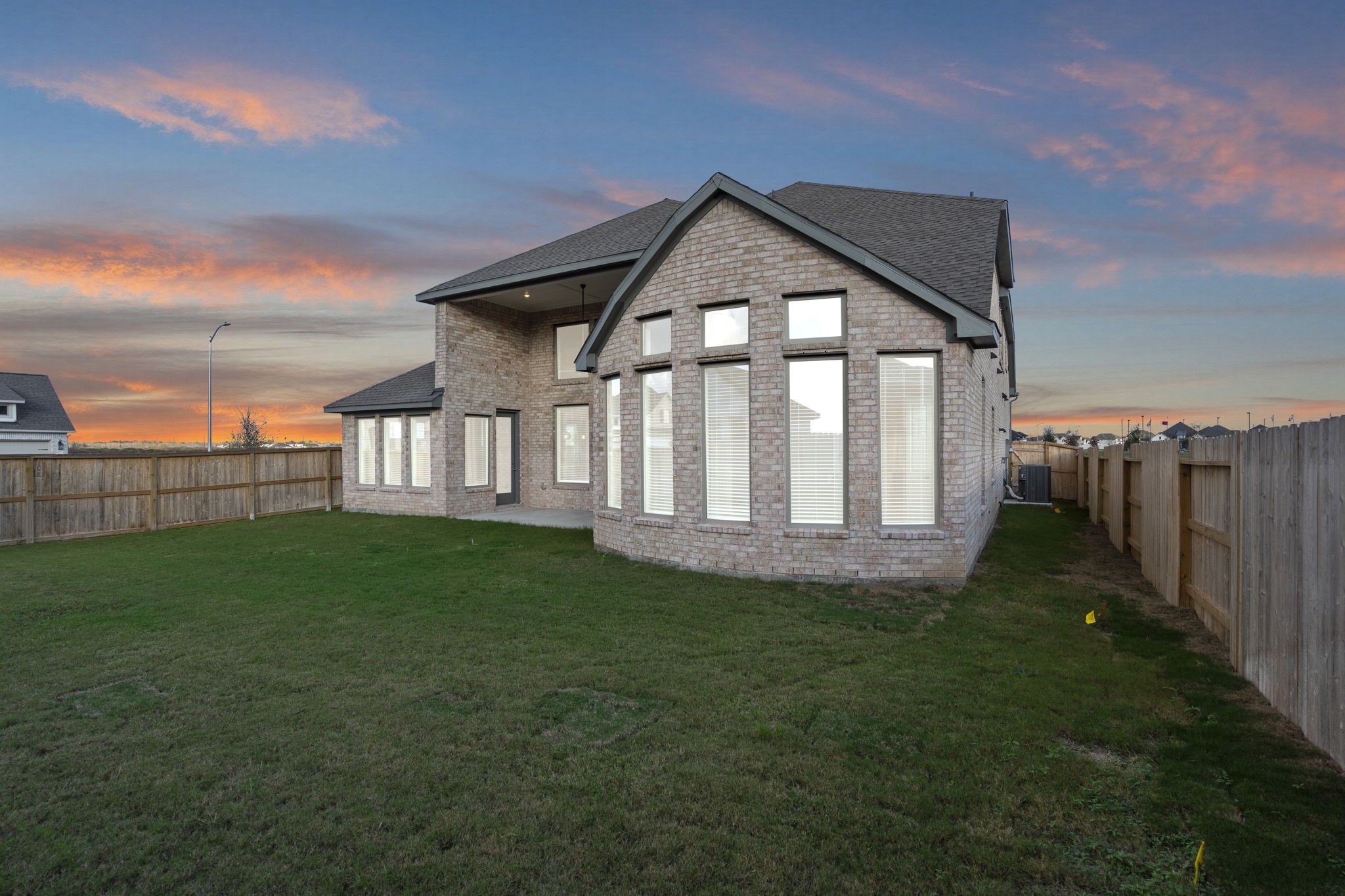 6402 Citron Elm Road Manvel, TX 77578 - Photo 27 of 37 a view of a house with a yard