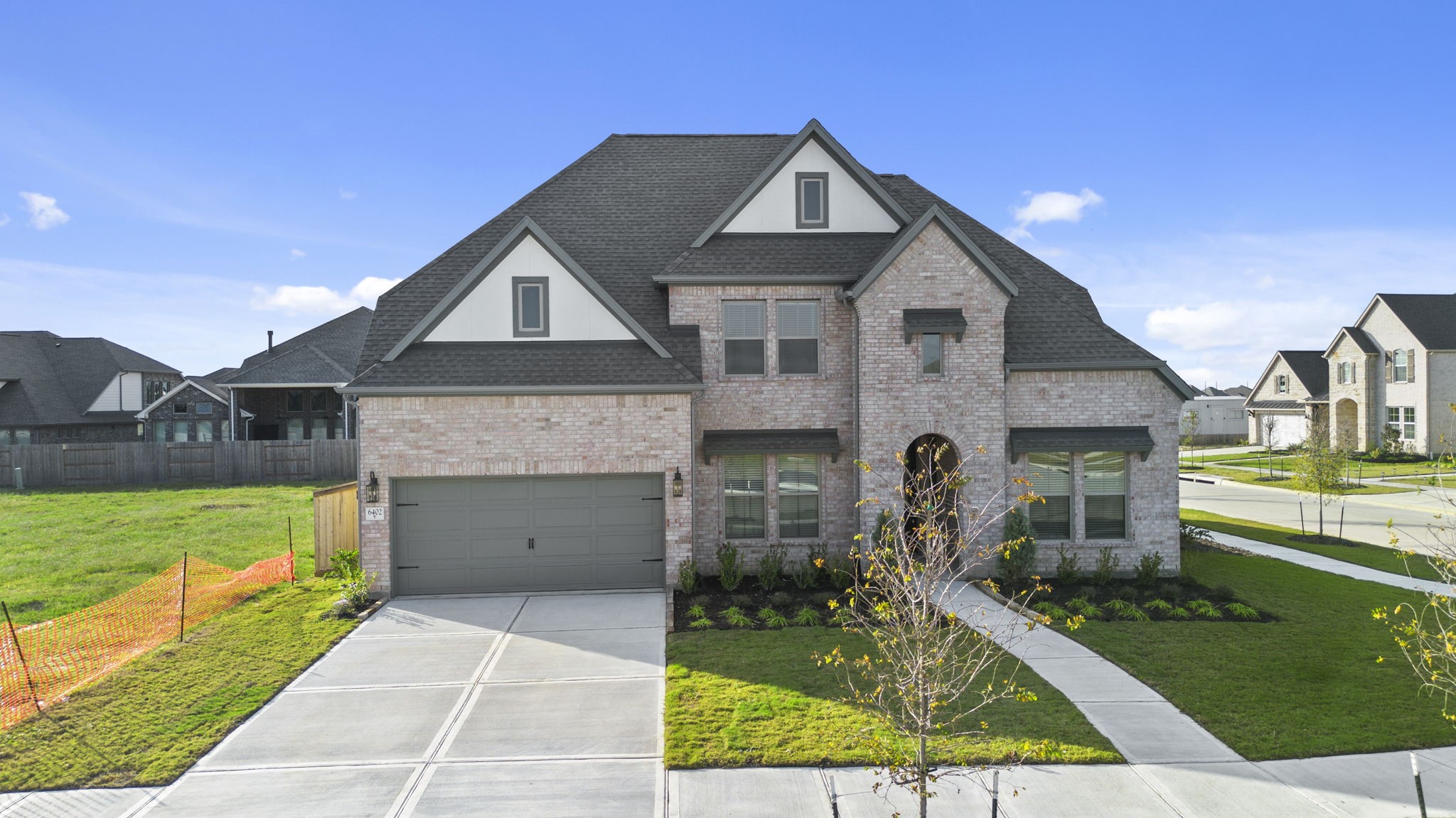 6402 Citron Elm Road Manvel, TX 77578 - Photo 30 of 37 a front view of a house with a yard