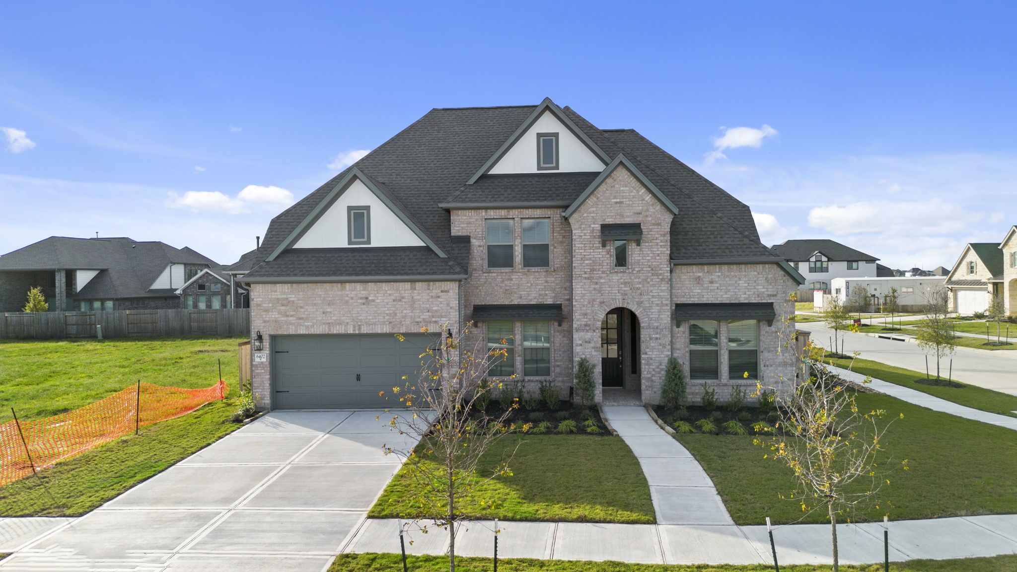 6402 Citron Elm Road Manvel, TX 77578 - Photo 31 of 37 a front view of a house with a yard