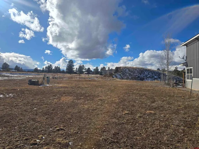 front view of a house with a large window