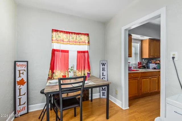 a room with a table and a workspace