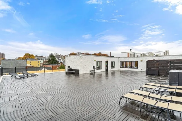 a view of a terrace with seating area