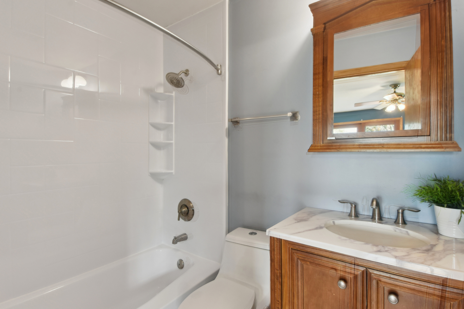 7N401 Stevens Road St. Charles, IL 60175 - Photo 20 of 33 a bathroom with a granite countertop sink toilet and shower