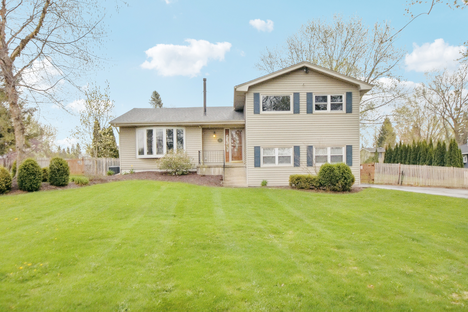 7N401 Stevens Road St. Charles, IL 60175 - Photo 2 of 33 a front view of a house with garden