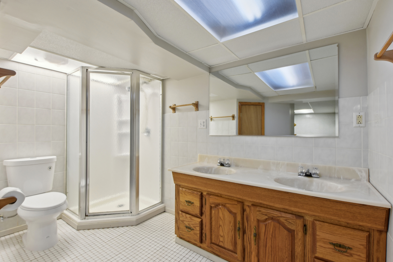 7N401 Stevens Road St. Charles, IL 60175 - Photo 25 of 33 a spacious bathroom with a double vanity sink mirror and toilet