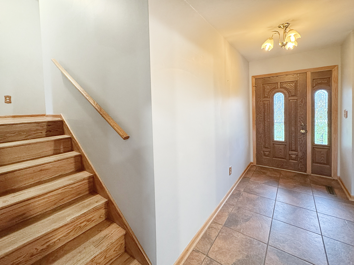 7N401 Stevens Road St. Charles, IL 60175 - Photo 4 of 33 a view of entryway and hall with wooden floor