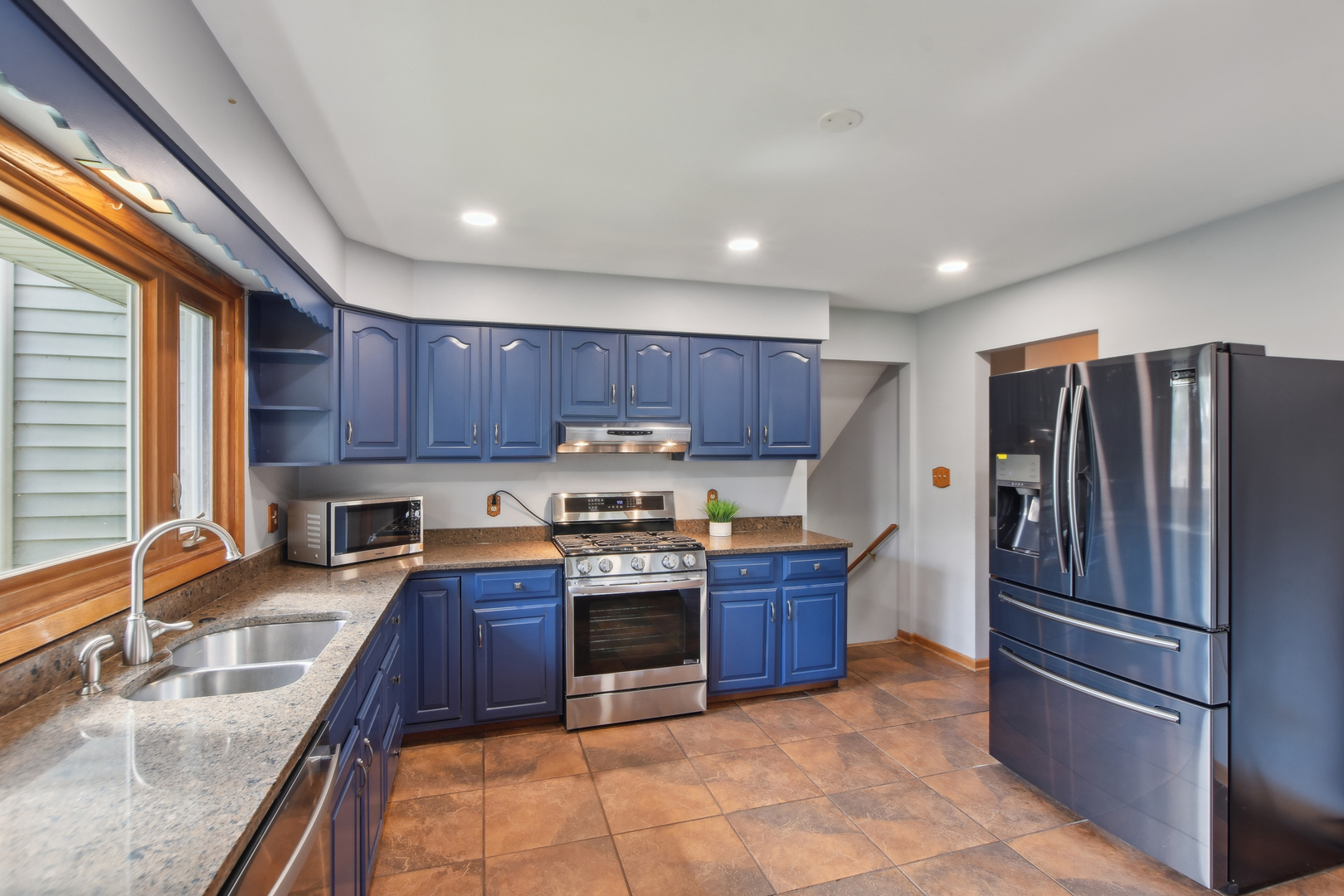 7N401 Stevens Road St. Charles, IL 60175 - Photo 6 of 33 a kitchen with stainless steel appliances granite countertop a refrigerator sink and cabinets