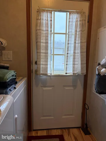 a view of storage and utility room