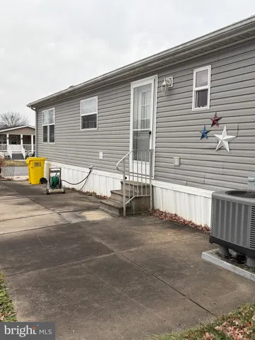 a view of a house with a patio